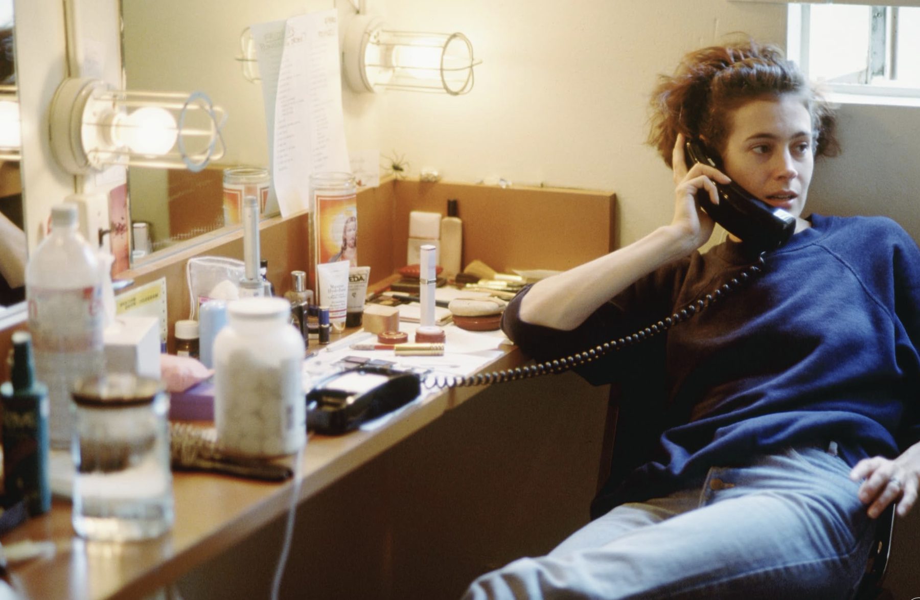 Sean Young at a dressing room mirror